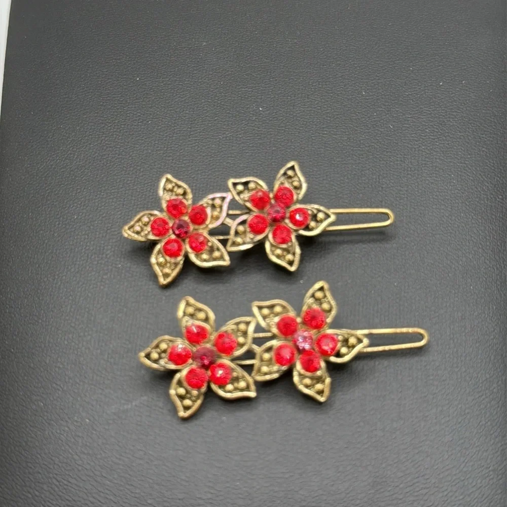 Beautiful red rhinestone statement brooch and complimentary hair barrettes